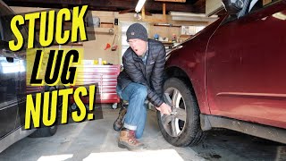 HOW TO Remove stuck lug nuts  wheel studs [upl. by Novaelc]