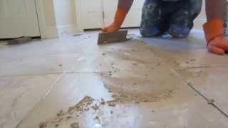 How to grout a tile floor [upl. by Yemiaj381]